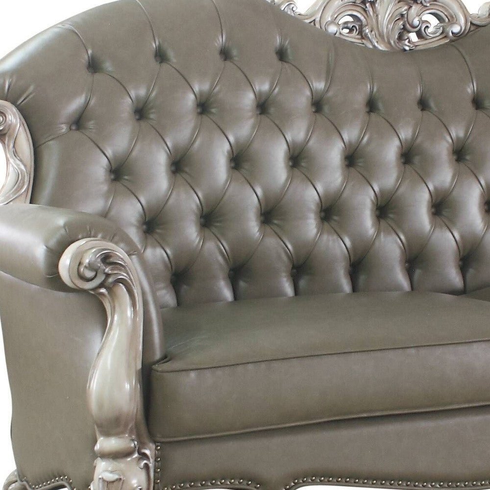 The Oryndal – 96" Bone Faux Leather Sofa with Toss Pillows & White Legs